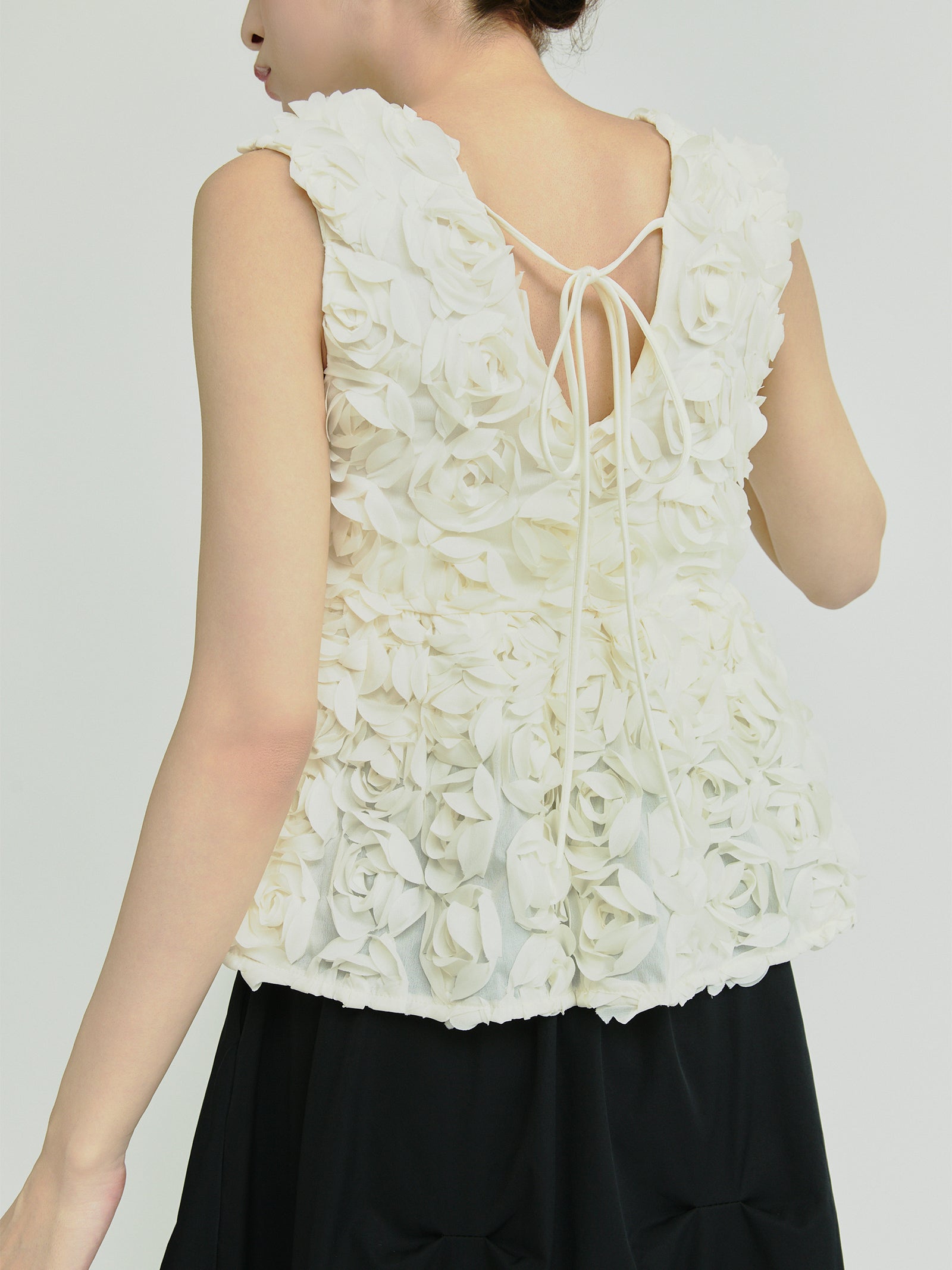 フラワーモチーフペプラムトップス