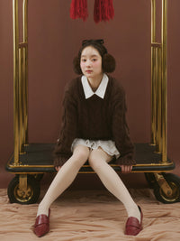 フリルレイヤードケーブルニット