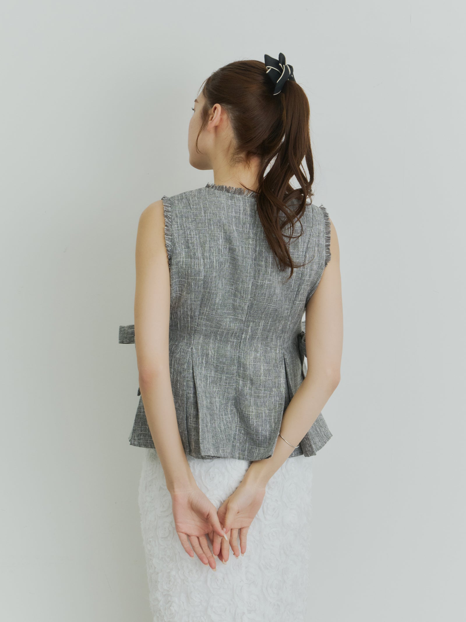 ツイードペプラムリボントップス