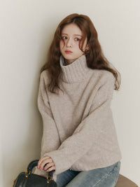 スパンコールタートルニット